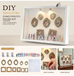 Detailansicht des DIY Miniatur Bilderrahmen Sets mit Zubehör, Figuren und Installationsanleitung.