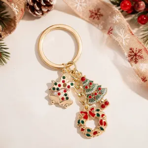 Christmas metal keychain featuring cute bell, tree and wreath charms for holiday gifts.