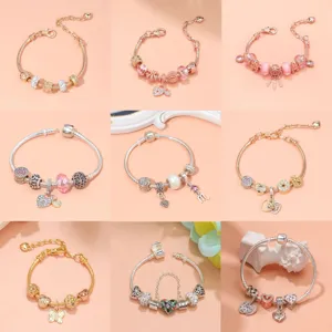 Set de pulsera de dijes oro rosa plata, elegante joyería estilo europeo para mujeres.