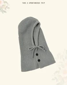 Grey knitted balaclava hood scarf with drawstring and buttons, warm winter detail view.