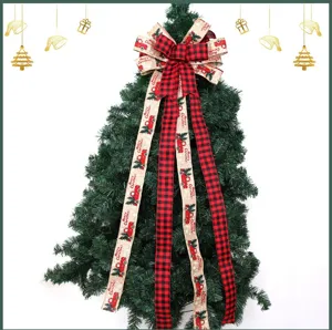 Large Christmas tree topper bow with red truck print and buffalo plaid ribbon holiday decor.