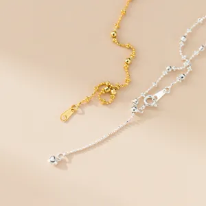 Detailed close-up view of exquisite S925 silver beaded chain necklace with heart pendant.