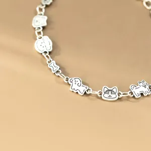 S990 silver cute puppy bone charm bracelet, delicate design and fine Thai silver details.