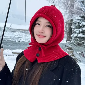 Red knitted balaclava hat for women, winter warm hooded scarf with buttons and drawstrings.