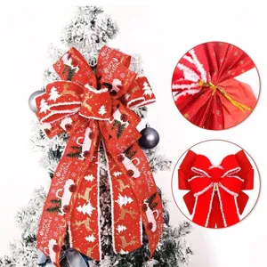 Large red flocked burlap Christmas tree bow decoration with classic festive patterns and white trim.