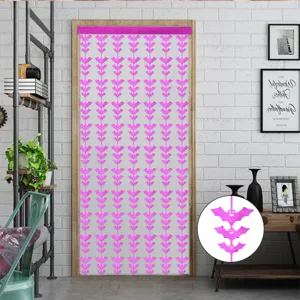 Detail view of pink bat tinsel curtain, perfect Halloween party hanging decoration.