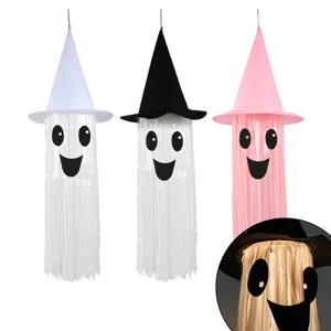 Halloween LED glowing ghost hanging decoration with witch hat for spooky party props setup.