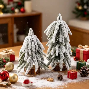 Detailed close-up view of frosted mini cedar Christmas trees with natural wood base decor.