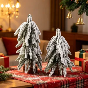 Detailed view of mini frosted Christmas tree, snow-covered cedar desktop decor with wood base.
