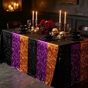 Halloween black purple orange tinsel table skirt for party table decoration setup.