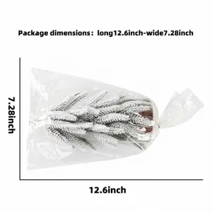 Mini frosted Christmas tree with wooden base, perfect desktop holiday decoration and display.