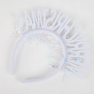 White Christmas tinsel headband detail shot, fluffy letter design for holiday party props.