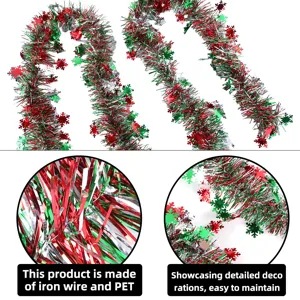 Christmas tinsel garland with metallic red green silver foil and snowflake decorations.