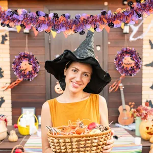 Halloween tinsel garland and wreath set in black orange purple for spooky party setup props.