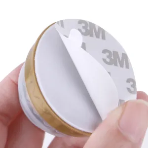 Rotating catnip ball toy for cats, self-adhesive wall mounted pet teeth cleaning toy backing view.