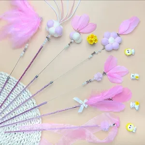 Varita mágica para gatos con plumas rosas, cintas y cascabeles, juguete interactivo perfecto.