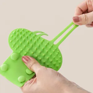 Silicone cat self groomer strap for table legs with massage bristles, green pet scratching toy.