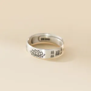 Detailed view of retro 999 silver lotus Fu ring, unique oriental design couple jewelry.