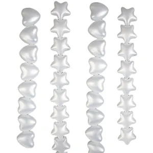 White pearl bead string decorations, featuring heart and star shapes for party backgrounds.