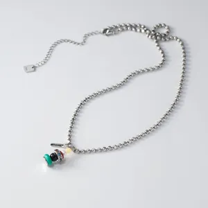Detail view of S925 sterling silver beaded necklace with colorful pendant, elegant and chic.