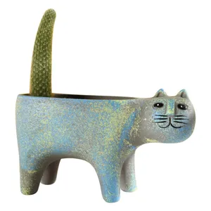 Cute ceramic cat flowerpot with cactus plant, vintage blue desktop potted decoration.