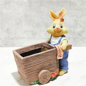Detailed view of the cute resin rabbit cart flower pot, perfect for garden and balcony decor.