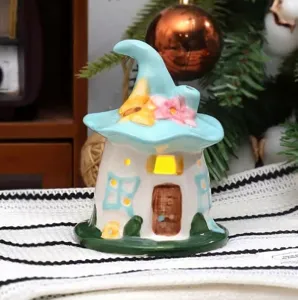 Handmade ceramic magic house night light and desktop ornament, perfect for holiday gifts.