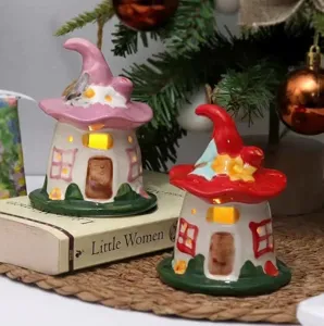 Ceramic mushroom night light detail shot, cozy glowing fairy house decor for bedroom desktop.
