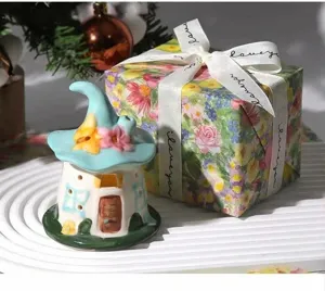 Ceramic magical house night light detail view, cozy tabletop decor and gift option.