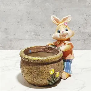 Resin succulent flower pot detail featuring a cute 3D cartoon rabbit and yellow floral relief.