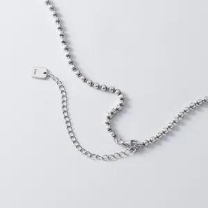 Close-up detail of the S925 sterling silver square bead necklace, showing exquisite clasp and tag.