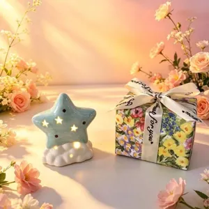 Ceramic star night light detail, cute desktop decoration, warm lighting, cozy room aesthetic setup.
