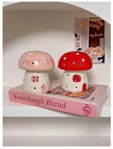 Detailed view of cute ceramic mushroom night light, charming tabletop decor for bedroom.