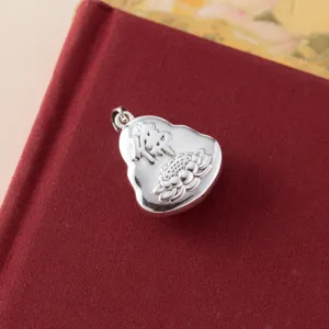 Detailed close-up view of the vintage 999 silver Maitreya Buddha and lotus pendant.