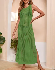 Green hollow knitted beach cover up dress detail view showing fine texture and sleeveless design.
