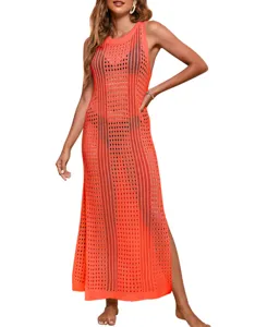 Close-up detail of the orange hollow-out knit crochet beach cover-up long dress design.