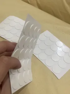 Detail view of foam double-sided glue dots, 20mm round adhesive stickers for candle wicks.