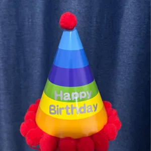 Colorful rainbow paper cone birthday party hat with red pom poms for kids celebration