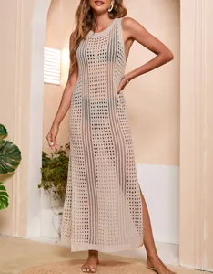 Detailed view of the hollow-out knit beach cover-up, showcasing exquisite crochet texture.