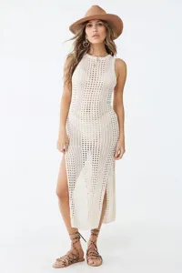 Detailed view of the hollow-out knit beach cover-up, showing delicate crochet texture.