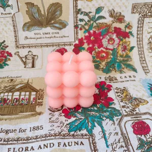 Pink bubble candle detail shot, aesthetic cube shape soy wax candle for home decor.