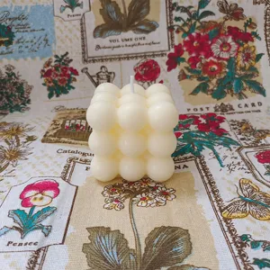 Aesthetic white bubble cube scented candle detail, geometric design, perfect home decor prop.
