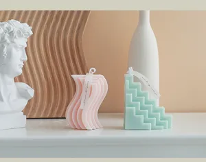 Aesthetic geometric scented soy wax candles set featuring wavy and staircase shapes for home decor.