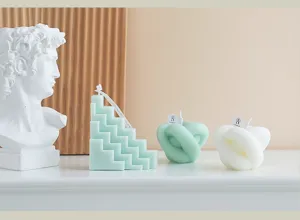 Minimalist geometric soy wax decorative candles set detail, aesthetic home decor and aroma.