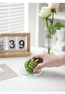 Green yarn ball scented candle photo prop lifestyle aesthetic home decor desktop ornament detail