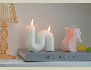 Geometric abstract wave scented candle set, unique soy wax home decor ornament details.