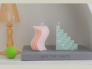 Handmade soy wax scented candles with unique geometric shapes, perfect for home decor and gifts.