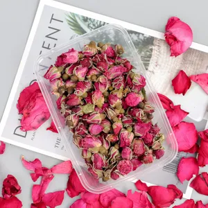 Dried rose flower buds in clear box with scattered petals, ideal detail for DIY scented candles.