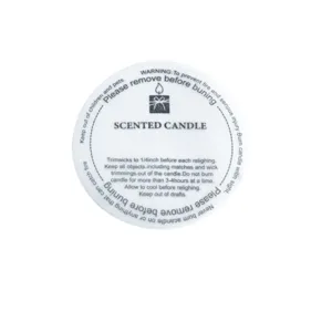 Scented candle dust cover paper lid warning sticker safety label detail close-up