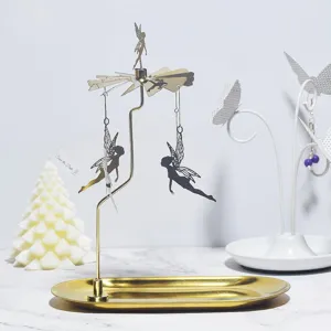 Porte-bougie rotatif en metal dore avec carrousel et silhouettes de fees pour decoration